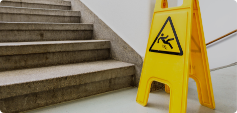 image of caution sign infront of staircase